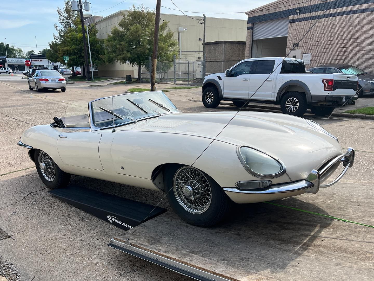 Picked up this really cool 1961 Jaguar XKE from the incredible collection over at @driversource in Houston. 5 stories of some of the world’s most sought after and legendary vehicles. Check out their showroom if you’re in the area!
.
.
.
.
.
.

#nicksautotransport #dreamtransporter #enclosedtransport #carhauler #carsofinstagram #carswithoutlimits #supercar #supercarsofinstagram #toyhauler #atc #aluminumtrailer #ford #powerstroke #platinum #carporn #raceramps #jaguar #xke #driversource