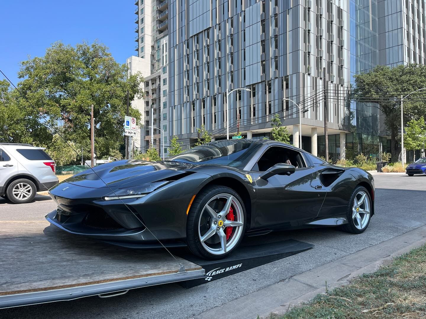 Just another day at the office. Super grateful for the opportunity to meet these guys and transport Tom’s badass Shark Werks GT3! Thanks again @seguratom @joerogan @duncantrussell @jamievernon @cota_official @longhornracingacademy @cotacab @whoapower 
.
.
.
.
.
.
.

#nicksautotransport #dreamtransporter #enclosedtransport #carhauler #carsofinstagram #carswithoutlimits #supercar #supercarsofinstagram #toyhauler #atc #aluminumtrailer #ford #powerstroke #platinum #carporn #raceramps #tomsegura #joerogan #duncantrussell #youngjamie