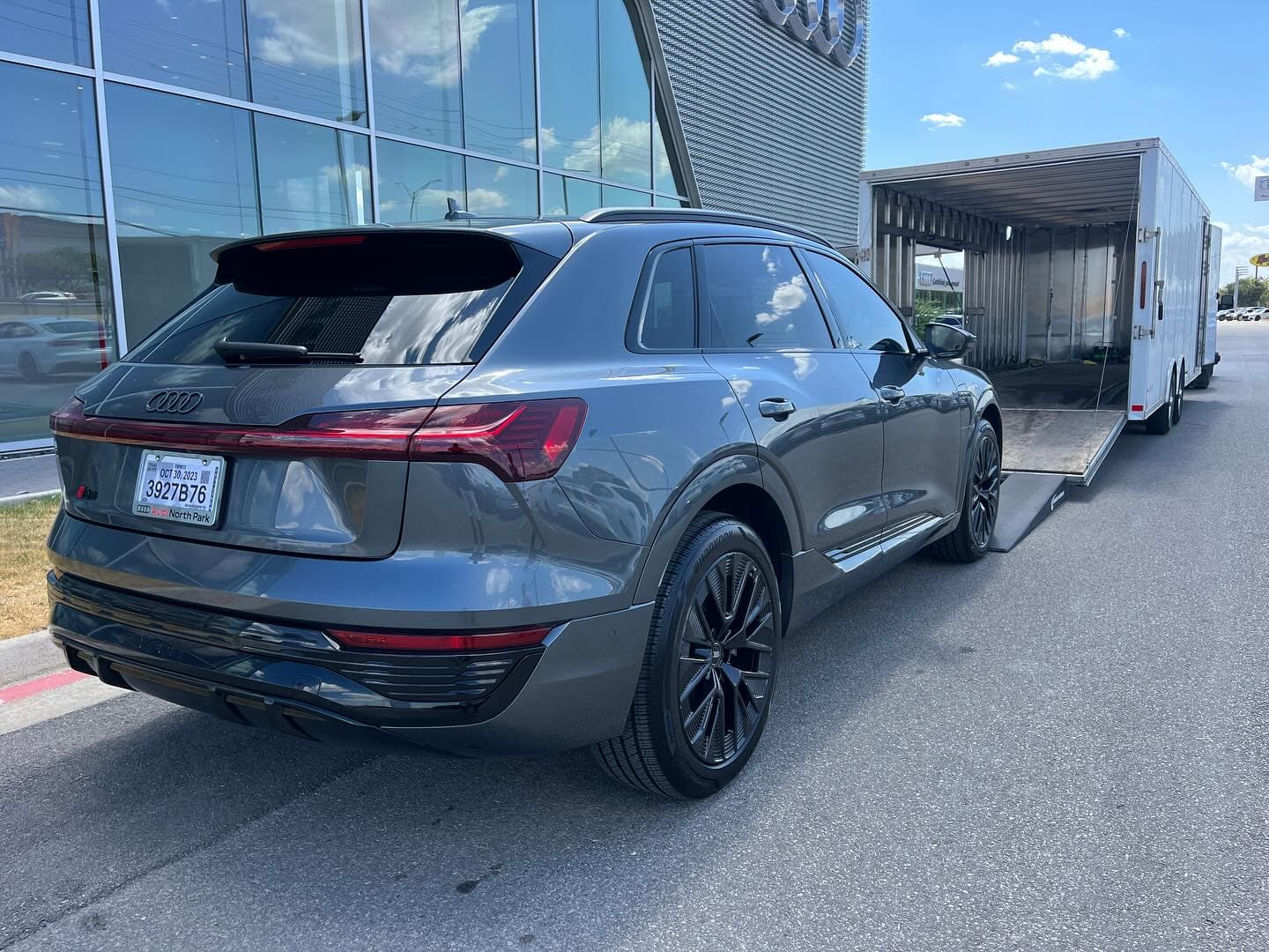 One of the first customer Audi Q8 e-trons ready to go home! Thanks to a repeat client and @audinorthpark for your new business. 
.
.
.
.
.
.
.

#nicksautotransport #dreamtransporter #enclosedtransport #carhauler #carsofinstagram #carswithoutlimits #supercar #supercarsofinstagram #toyhauler #atc #aluminumtrailer #ford #powerstroke #platinum #carporn #raceramps #audi @audi #q8 #etron #ev #electrifyamerica