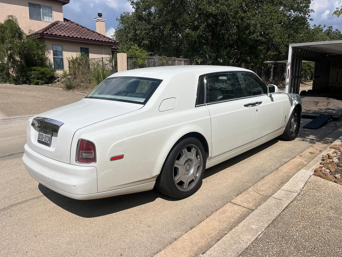 This is the definition of a land yacht. At over 19 ft in length, this thing is an absolute unit. Boasting some of the finest finishes you can get in an automobile, the 2006 Rolls Royce Phantom. Still beautiful even 17 years after it was made. 
.
.
.
.
.
.

#nicksautotransport #dreamtransporter #enclosedtransport #carhauler #carsofinstagram #carswithoutlimits #supercar #supercarsofinstagram #toyhauler #atc #aluminumtrailer #ford #powerstroke #platinum #carporn #raceramps #rollsroyce #rolls #royce #landyacht