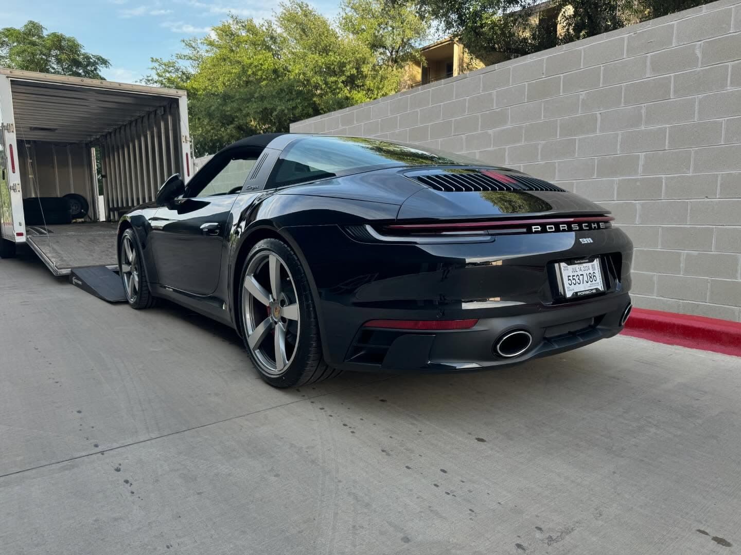 Super high spec 2024 Porsche 911 Targa heading into XPEL Austin for their magic. Pleased to be working with some of the finest automotive car shops in the area! 
.
.
.
.
.
.
#nicksautotransport #dreamtransporter #enclosedtransport #carhauler #carsofinstagram #carswithoutlimits #supercar #supercarsofinstagram #toyhauler #atc #aluminumtrailer #ford #powerstroke #platinum #carporn #raceramps #porsche #targa #911 #911targa #stuttgart #xpel #ppf