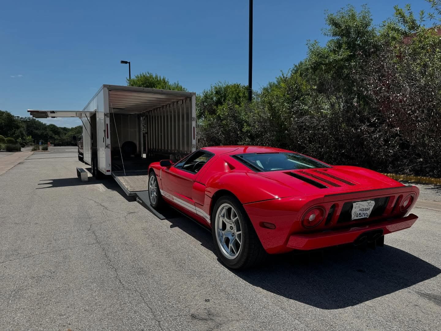 Another stunning red beauty heading to @revivalsstash is this 2006 Ford GT. What an absolutely gorgeous car. In perfect condition too. My favor shade of red! 
.
.
.
.
.
.
.
#nicksautotransport #dreamtransporter #enclosedtransport #carhauler #carsofinstagram #carswithoutlimits #supercar #supercarsofinstagram #toyhauler #atc #aluminumtrailer #ford #powerstroke #platinum #carporn #raceramps #fordgt #americanmuscle