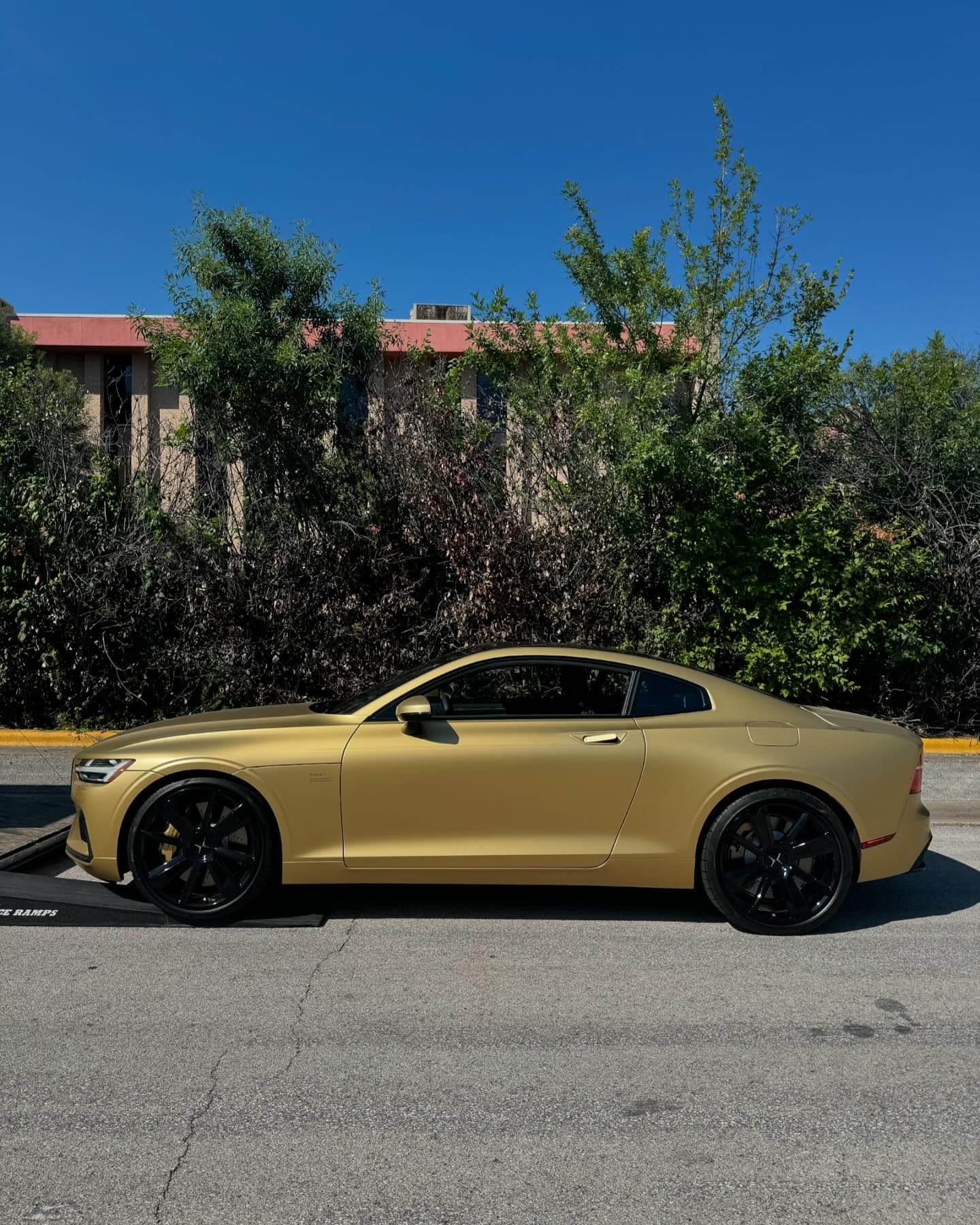 I bet you haven’t seen one of these on the road before. 2021 Polestar 1. Only 1500 units were produced for the 3 year production run. However, there exists only 25 of these - the final production run in commemorative matte gold paint. With 600 hp from the 2 liter turbo and 2 electric motors, this car defines the word sleeper. 
.
.
.
.
.
.
.
#nicksautotransport #dreamtransporter #enclosedtransport #carhauler #carsofinstagram #carswithoutlimits #supercar #supercarsofinstagram #toyhauler #atc #aluminumtrailer #ford #powerstroke #platinum #carporn #raceramps #volvo #polestar #polestar1